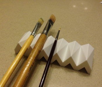 Customizable paintbrush holder